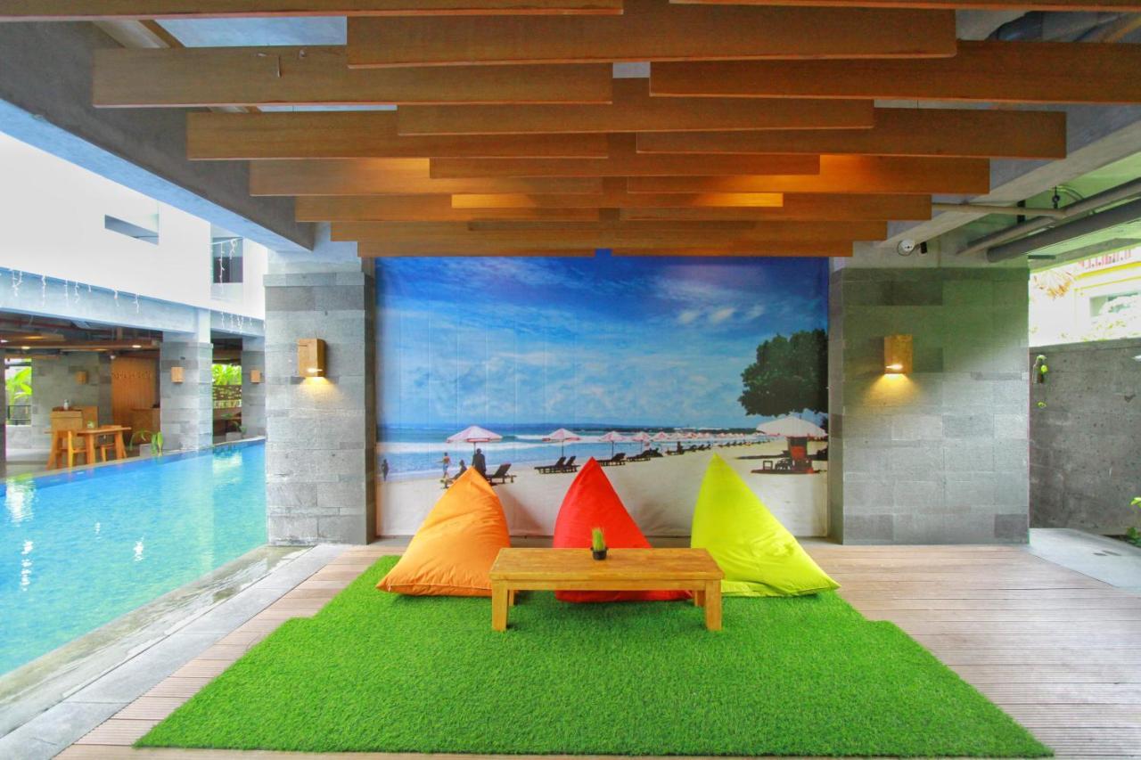 Отель Swiss-Belexpress Kuta Legian Экстерьер фото